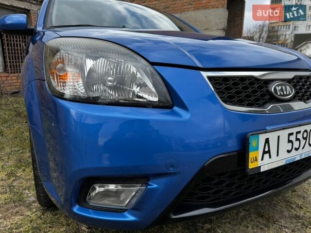 Синій Кіа Ріо, об'ємом двигуна 1.4 л та пробігом 93 тис. км за 8200 $, фото 12 на Automoto.ua