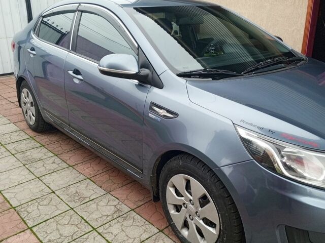 Синій Кіа Ріо, об'ємом двигуна 1.4 л та пробігом 210 тис. км за 7700 $, фото 10 на Automoto.ua