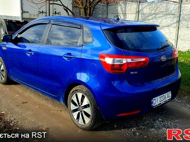Синій Кіа Ріо, об'ємом двигуна 1.6 л та пробігом 94 тис. км за 5300 $, фото 6 на Automoto.ua