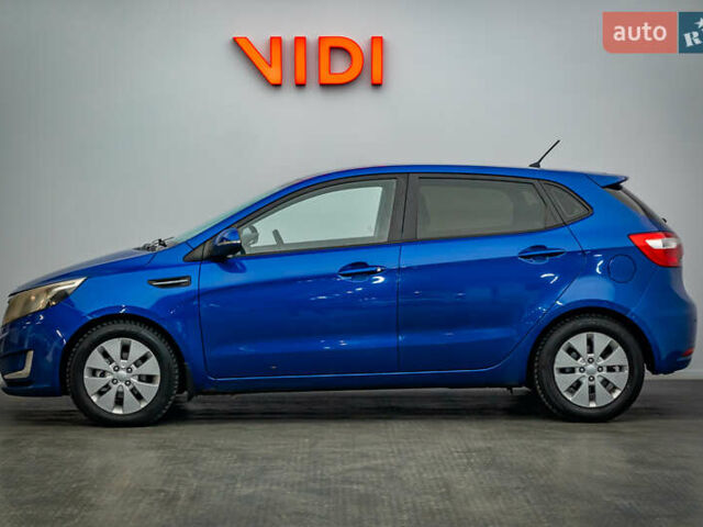 Синий Киа Рио, объемом двигателя 1.6 л и пробегом 211 тыс. км за 6049 $, фото 2 на Automoto.ua