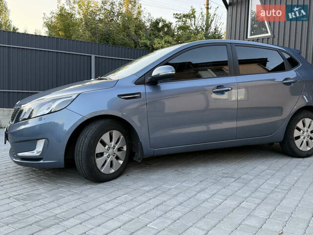 Синій Кіа Ріо, об'ємом двигуна 1.6 л та пробігом 103 тис. км за 8300 $, фото 4 на Automoto.ua