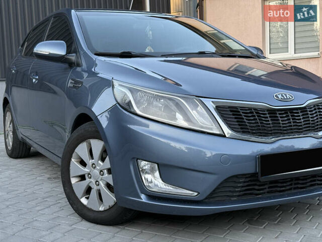 Синій Кіа Ріо, об'ємом двигуна 1.6 л та пробігом 103 тис. км за 8300 $, фото 1 на Automoto.ua