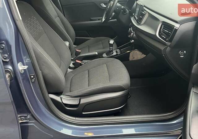 Синий Киа Рио, объемом двигателя 1.4 л и пробегом 61 тыс. км за 12431 $, фото 5 на Automoto.ua