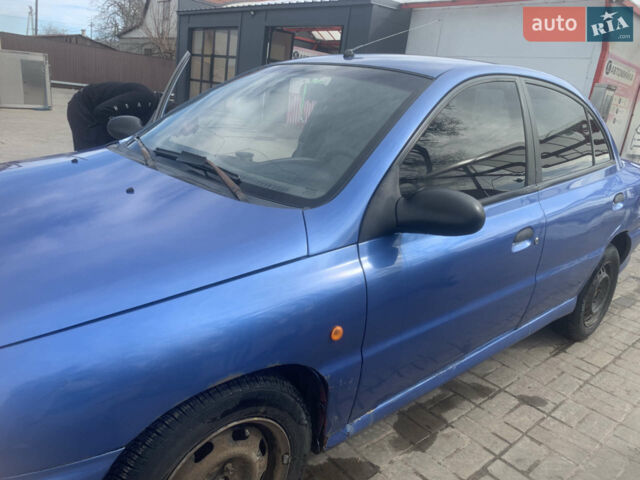 Синій Кіа Ріо, об'ємом двигуна 1.34 л та пробігом 445 тис. км за 1700 $, фото 4 на Automoto.ua