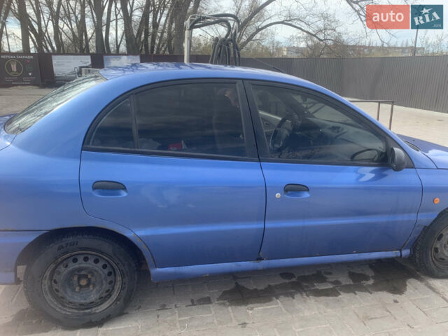 Синій Кіа Ріо, об'ємом двигуна 1.34 л та пробігом 445 тис. км за 1700 $, фото 1 на Automoto.ua