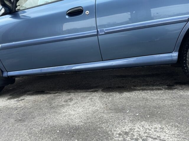 Синій Кіа Ріо, об'ємом двигуна 1.3 л та пробігом 240 тис. км за 2200 $, фото 7 на Automoto.ua