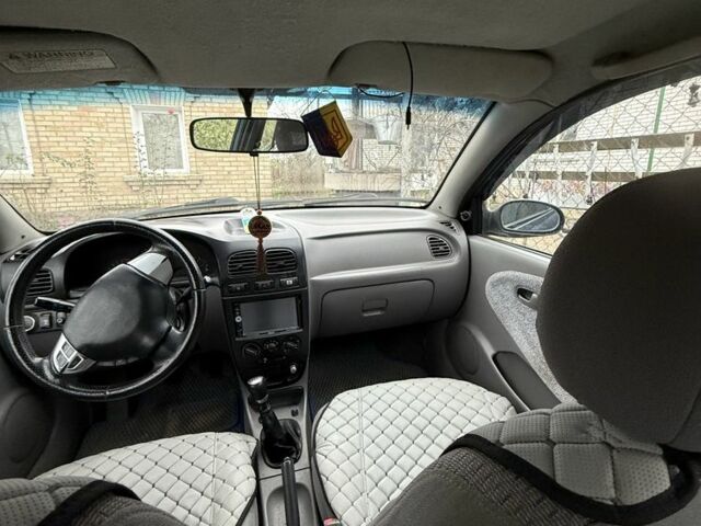 Синій Кіа Ріо, об'ємом двигуна 1.3 л та пробігом 296 тис. км за 2990 $, фото 3 на Automoto.ua