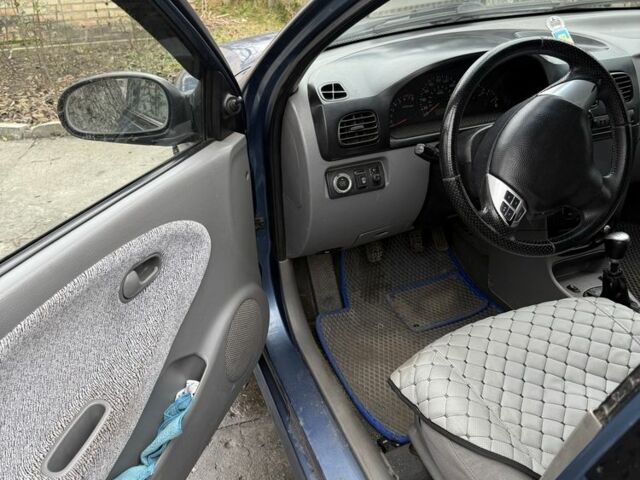 Синій Кіа Ріо, об'ємом двигуна 1.3 л та пробігом 296 тис. км за 1800 $, фото 5 на Automoto.ua