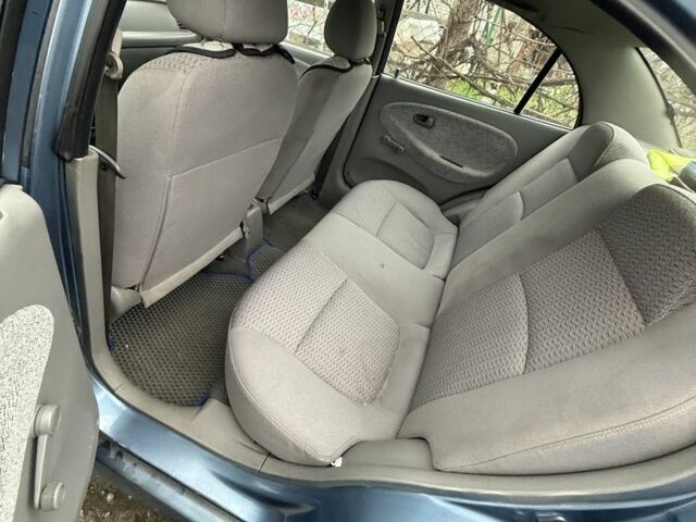 Синій Кіа Ріо, об'ємом двигуна 1.3 л та пробігом 296 тис. км за 2990 $, фото 4 на Automoto.ua