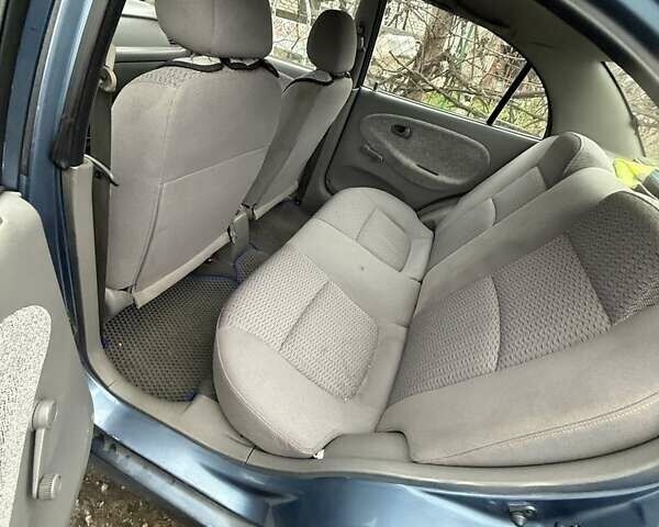 Синій Кіа Ріо, об'ємом двигуна 1.3 л та пробігом 296 тис. км за 2990 $, фото 3 на Automoto.ua