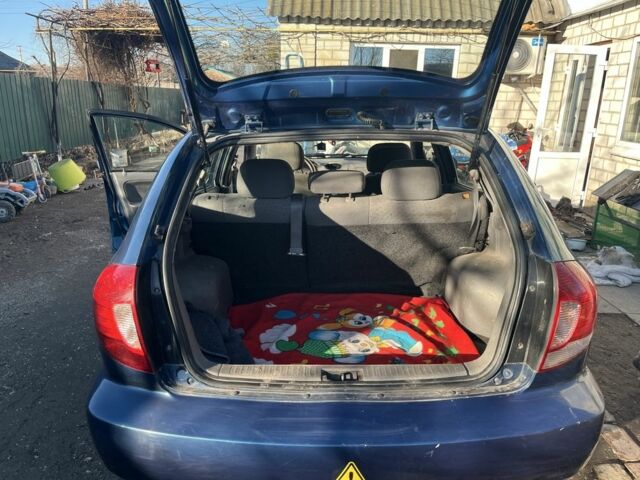 Синій Кіа Ріо, об'ємом двигуна 1.5 л та пробігом 2 тис. км за 2800 $, фото 1 на Automoto.ua