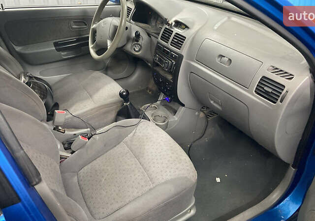 Синий Киа Рио, объемом двигателя 1.34 л и пробегом 238 тыс. км за 2650 $, фото 6 на Automoto.ua