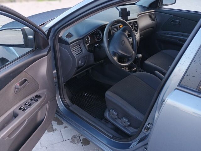 Синій Кіа Ріо, об'ємом двигуна 0 л та пробігом 177 тис. км за 4999 $, фото 4 на Automoto.ua