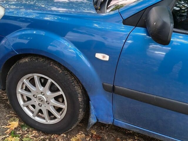 Синій Кіа Ріо, об'ємом двигуна 1.4 л та пробігом 200 тис. км за 2800 $, фото 6 на Automoto.ua