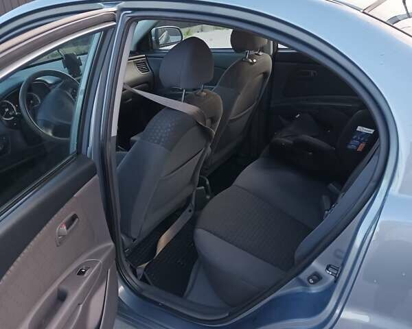 Синий Киа Рио, объемом двигателя 1.4 л и пробегом 176 тыс. км за 5250 $, фото 4 на Automoto.ua