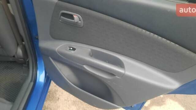 Синий Киа Рио, объемом двигателя 1.4 л и пробегом 122 тыс. км за 4500 $, фото 8 на Automoto.ua