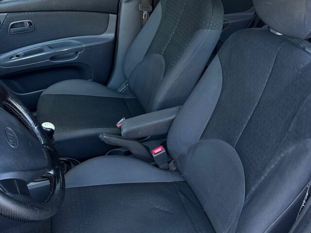 Синий Киа Рио, объемом двигателя 1.4 л и пробегом 279 тыс. км за 3300 $, фото 13 на Automoto.ua