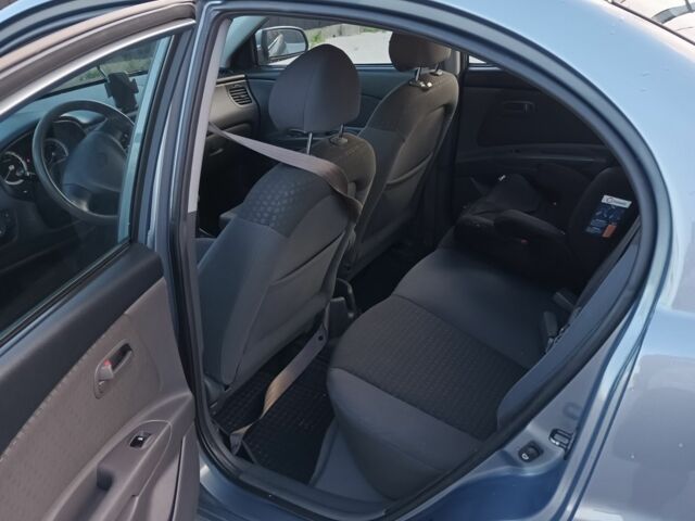 Синій Кіа Ріо, об'ємом двигуна 0 л та пробігом 177 тис. км за 4999 $, фото 6 на Automoto.ua