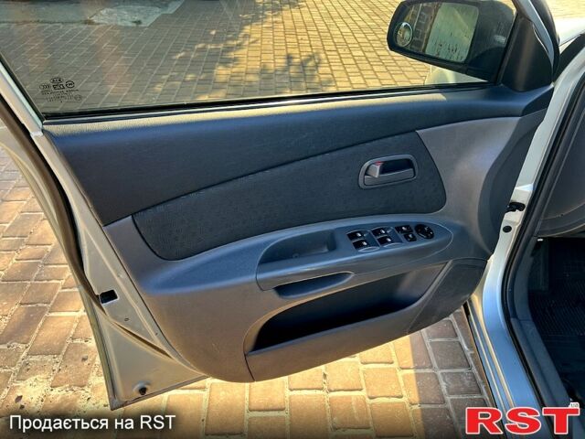 Синий Киа Рио, объемом двигателя 1.4 л и пробегом 261 тыс. км за 4899 $, фото 7 на Automoto.ua