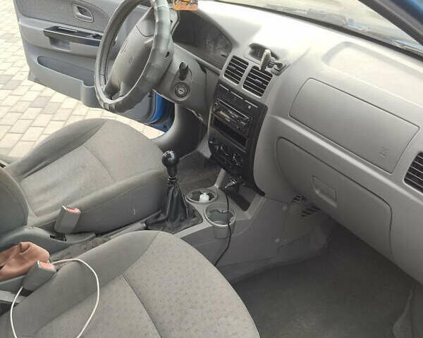 Синій Кіа Ріо, об'ємом двигуна 1.3 л та пробігом 205 тис. км за 2300 $, фото 7 на Automoto.ua