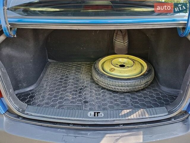 Синій Кіа Ріо, об'ємом двигуна 1.3 л та пробігом 190 тис. км за 2900 $, фото 8 на Automoto.ua