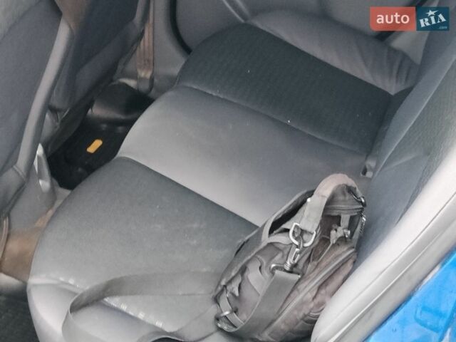 Синий Киа Рио, объемом двигателя 1.4 л и пробегом 310 тыс. км за 3450 $, фото 7 на Automoto.ua