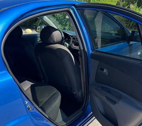 Синий Киа Рио, объемом двигателя 1.4 л и пробегом 172 тыс. км за 4200 $, фото 12 на Automoto.ua
