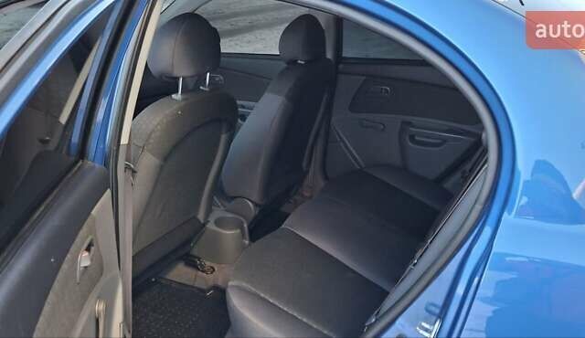 Синій Кіа Ріо, об'ємом двигуна 1.4 л та пробігом 177 тис. км за 4200 $, фото 9 на Automoto.ua