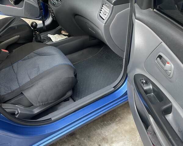 Синий Киа Рио, объемом двигателя 1.4 л и пробегом 177 тыс. км за 5000 $, фото 9 на Automoto.ua