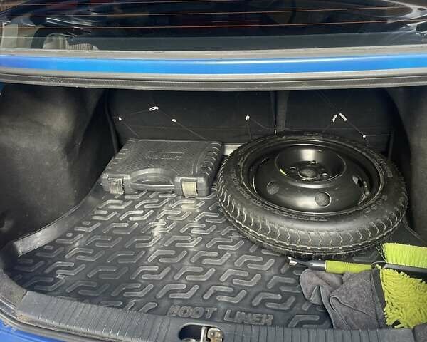 Синий Киа Рио, объемом двигателя 1.4 л и пробегом 177 тыс. км за 5000 $, фото 11 на Automoto.ua