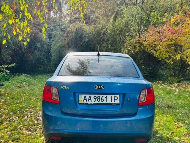 Синий Киа Рио, объемом двигателя 1.4 л и пробегом 300 тыс. км за 4700 $, фото 2 на Automoto.ua