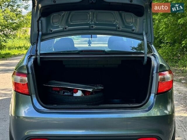 Синій Кіа Ріо, об'ємом двигуна 1.59 л та пробігом 128 тис. км за 6800 $, фото 9 на Automoto.ua