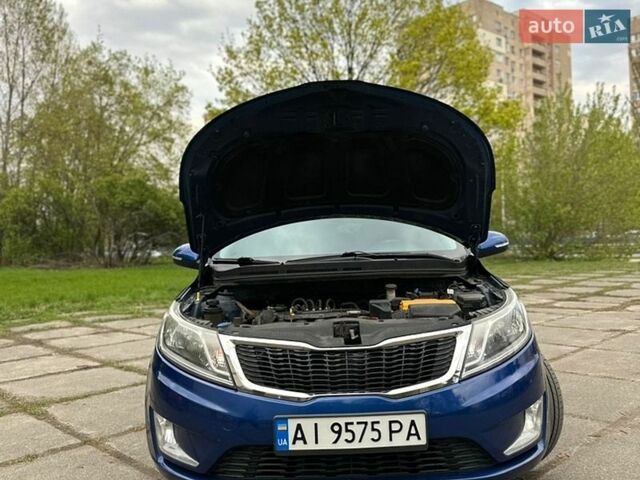 Синий Киа Рио, объемом двигателя 1.59 л и пробегом 273 тыс. км за 7550 $, фото 3 на Automoto.ua