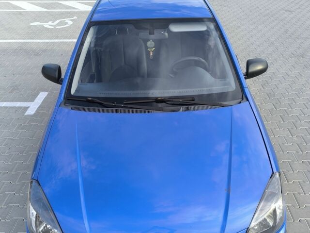 Синий Киа Рио, объемом двигателя 1.4 л и пробегом 220 тыс. км за 3799 $, фото 7 на Automoto.ua