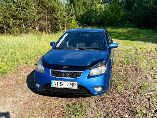 Синий Киа Рио, объемом двигателя 1.4 л и пробегом 138 тыс. км за 6950 $, фото 2 на Automoto.ua