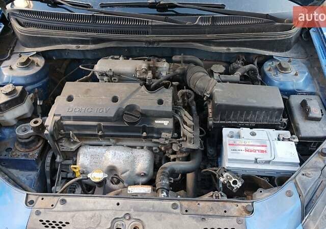 Синий Киа Рио, объемом двигателя 1.4 л и пробегом 211 тыс. км за 3600 $, фото 4 на Automoto.ua