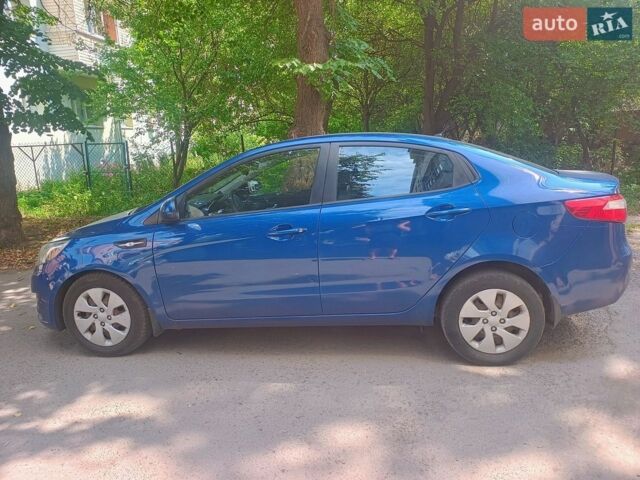 Синій Кіа Ріо, об'ємом двигуна 1.4 л та пробігом 138 тис. км за 7900 $, фото 2 на Automoto.ua