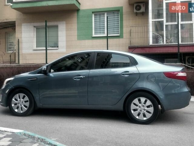 Синій Кіа Ріо, об'ємом двигуна 1.6 л та пробігом 182 тис. км за 7900 $, фото 9 на Automoto.ua