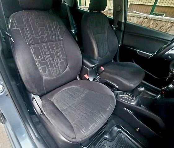 Синій Кіа Ріо, об'ємом двигуна 1.6 л та пробігом 182 тис. км за 7900 $, фото 11 на Automoto.ua