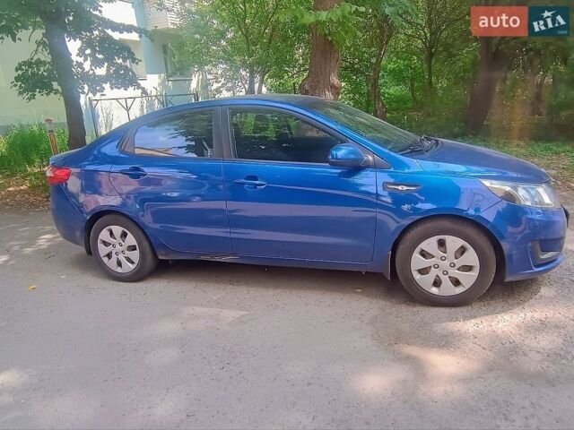 Синій Кіа Ріо, об'ємом двигуна 1.4 л та пробігом 138 тис. км за 7900 $, фото 4 на Automoto.ua