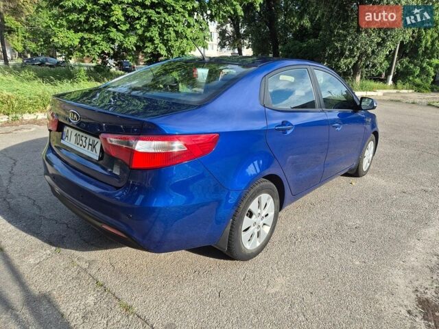 Синій Кіа Ріо, об'ємом двигуна 1.6 л та пробігом 150 тис. км за 8350 $, фото 3 на Automoto.ua