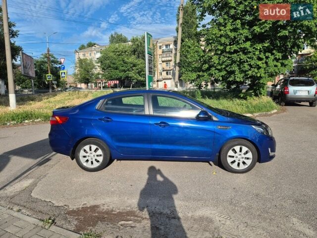 Синій Кіа Ріо, об'ємом двигуна 1.6 л та пробігом 150 тис. км за 8350 $, фото 4 на Automoto.ua
