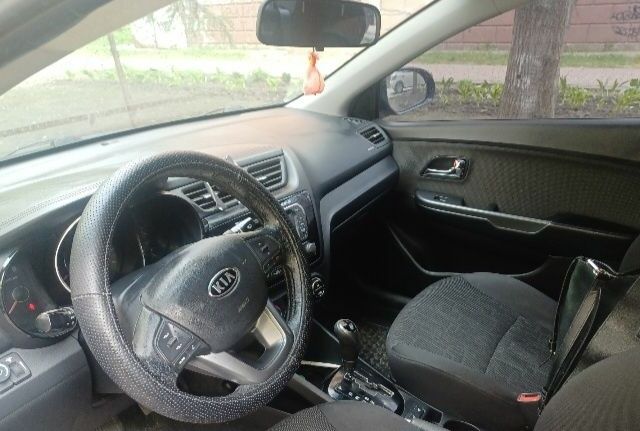 Синий Киа Рио, объемом двигателя 1.6 л и пробегом 233 тыс. км за 8000 $, фото 3 на Automoto.ua