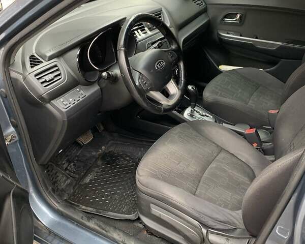 Синий Киа Рио, объемом двигателя 1.59 л и пробегом 182 тыс. км за 7000 $, фото 4 на Automoto.ua