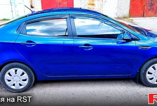 Синій Кіа Ріо, об'ємом двигуна 1.6 л та пробігом 158 тис. км за 8700 $, фото 9 на Automoto.ua
