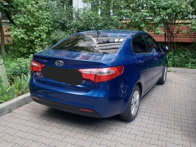 Синий Киа Рио, объемом двигателя 1.6 л и пробегом 233 тыс. км за 8000 $, фото 1 на Automoto.ua
