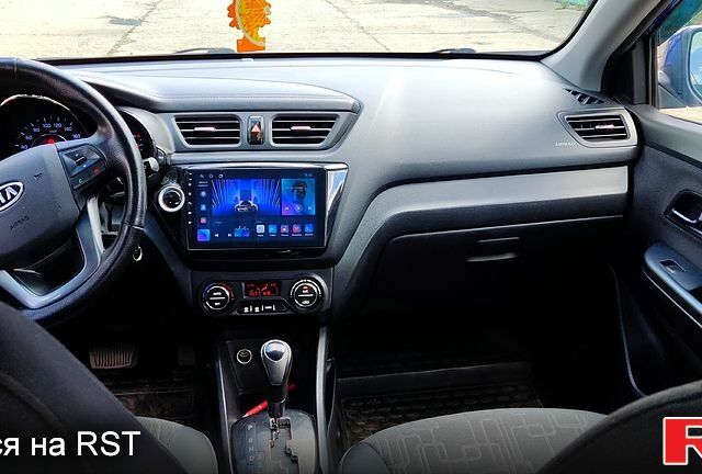 Синий Киа Рио, объемом двигателя 1.6 л и пробегом 158 тыс. км за 8700 $, фото 2 на Automoto.ua