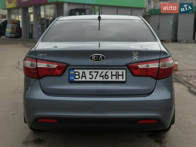 Синий Киа Рио, объемом двигателя 1.59 л и пробегом 163 тыс. км за 8300 $, фото 2 на Automoto.ua