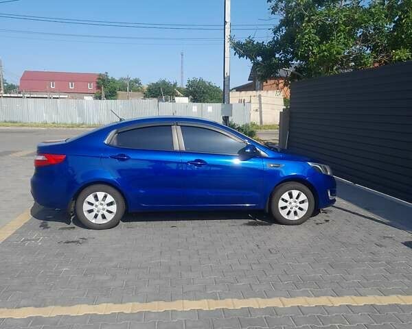 Синий Киа Рио, объемом двигателя 1.6 л и пробегом 211 тыс. км за 7600 $, фото 3 на Automoto.ua