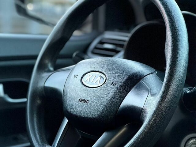 Синий Киа Рио, объемом двигателя 1.4 л и пробегом 138 тыс. км за 8399 $, фото 14 на Automoto.ua